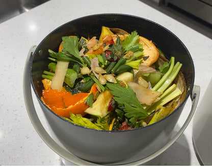 Eco 5 bucket filled with fruit and vegetable scraps